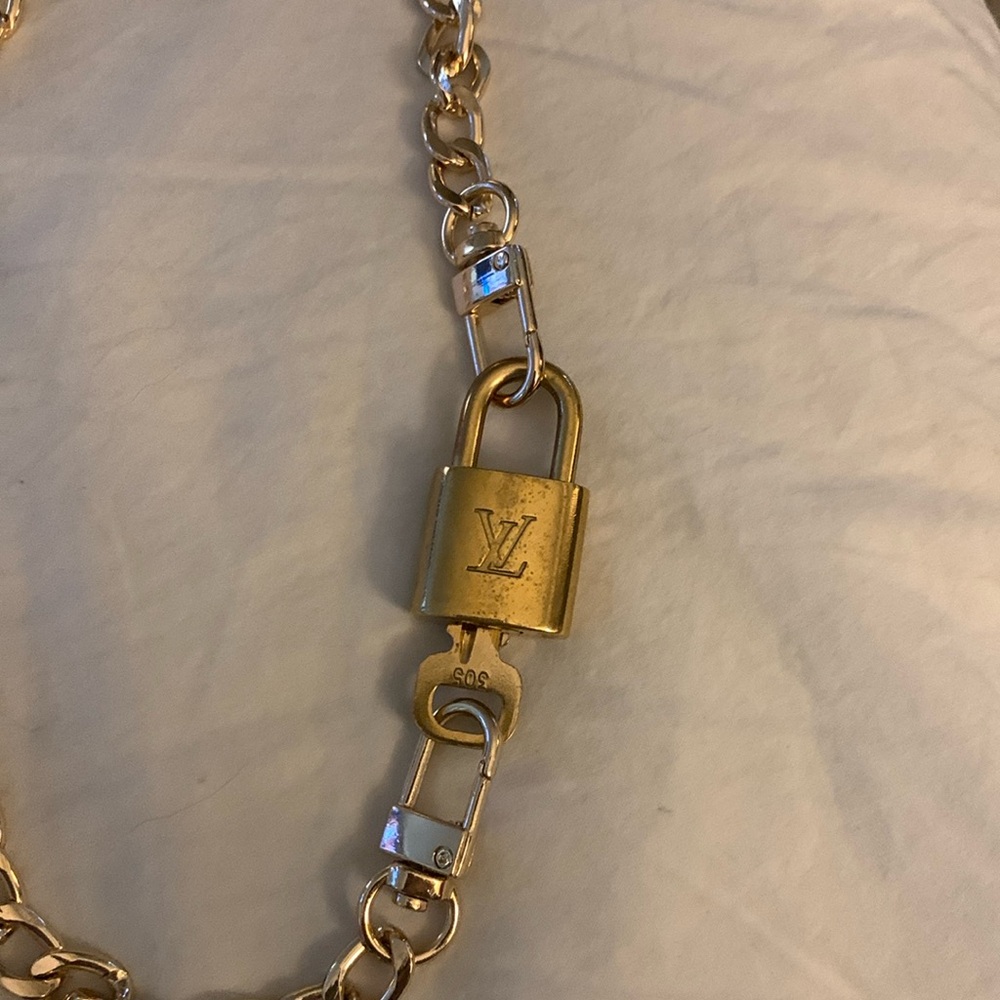 Louis Vuitton Gold Padlock and Key Set